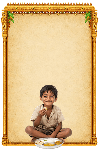 A smiling child seated with a plate of prasadam