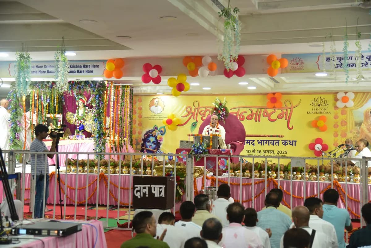 Devotees gathered for kirtan and a festival class in the temple hall
