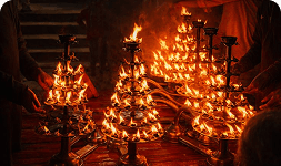 Rows of lit ghee lamps during Mangala Aarti