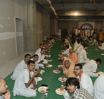 A sadhu reading scripture