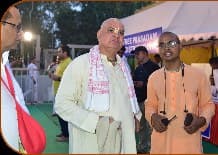 Devotees greeting a visiting sanyasi at ISKCON Kurukshetra