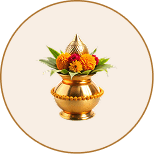A brass kalash crowned with a coconut and mango leaves