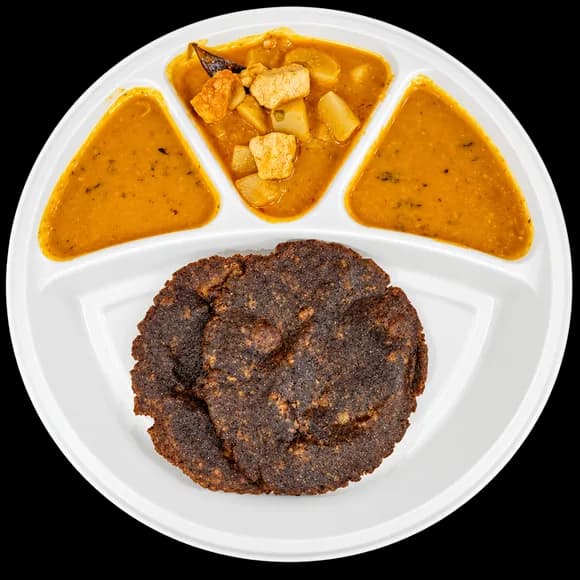 A thali of freshly prepared prasadam offered as Bhoga